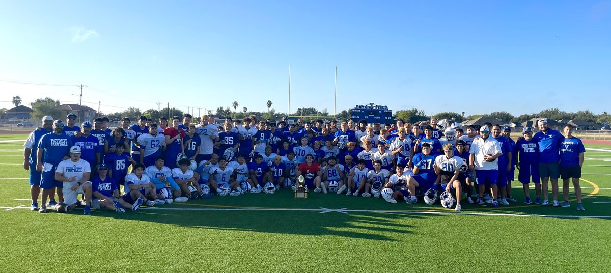 We had a visitor at practice this morning. She was gold. She was shiny. She had the word CHAMPION written on her. She was beautiful. So, we set her on the ground in front of us and took a picture with her so we could share it with Big Blue Nation. This picture was EARNED!!!!!!!