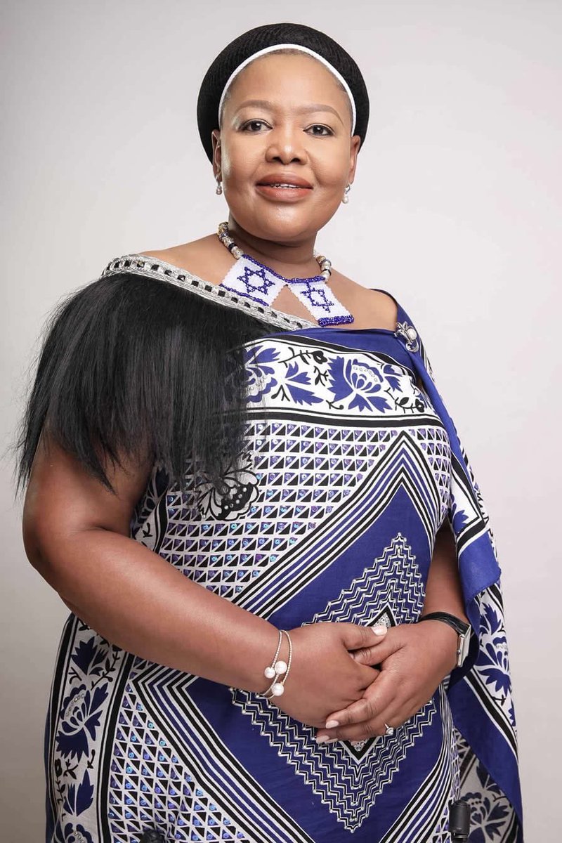 stacky_t's tweet photo. It is not a surprise to see @EswatiniGovern1  former Minister of Justice, Mswati’s sister and reappointed senator Princess Pholile Dlamini Shakantu wearing Ligcebesha with Israel flag at the swearing ceremony yesterday.There is no difference between Tinkundla and Israel Apartheid https://t.co/SWt8i5o4tC
