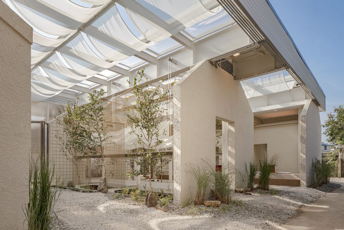 ArchDaily's tweet photo. Natural decay caused structural damage: eroded purlins and rotting frames led to falling roof tiles, exposing the #interior. The open roof turned the floor to earth. https://t.co/7ePR16IV3c #architecture #cafe #design https://t.co/9yRhGrTy09