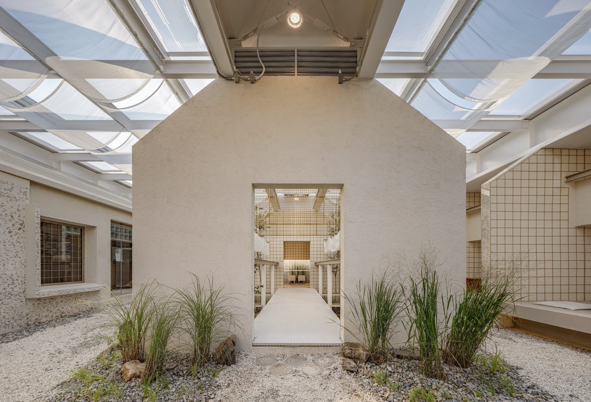 ArchDaily's tweet photo. Natural decay caused structural damage: eroded purlins and rotting frames led to falling roof tiles, exposing the #interior. The open roof turned the floor to earth. https://t.co/7ePR16IV3c #architecture #cafe #design https://t.co/9yRhGrTy09