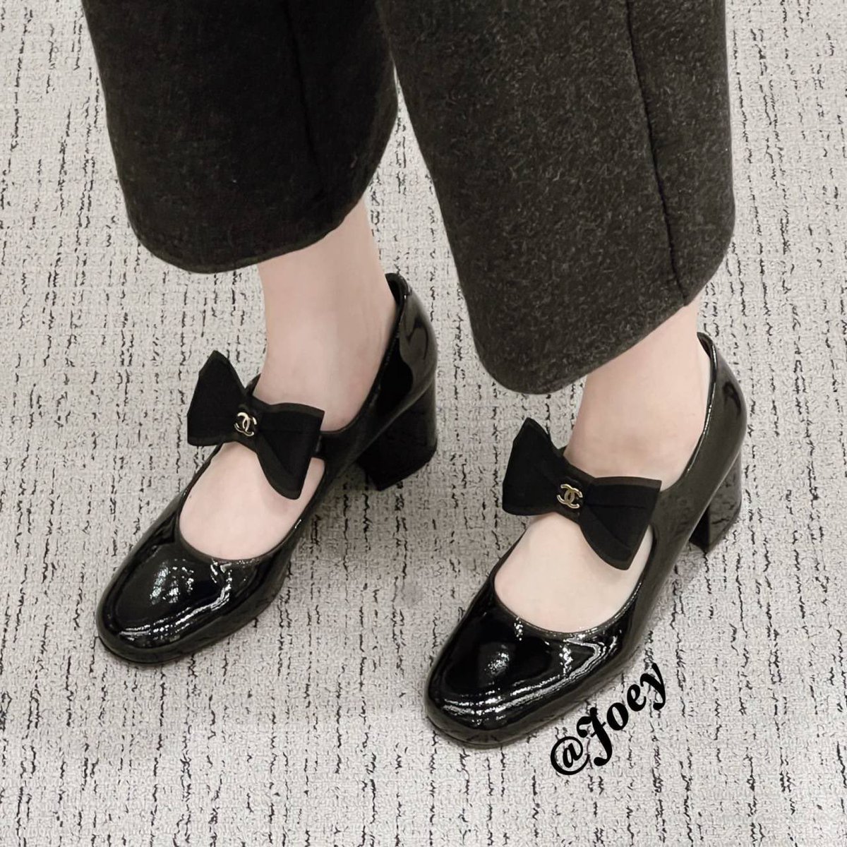 black footwear 1girl solo shoes high heels bow wooden floor  illustration images