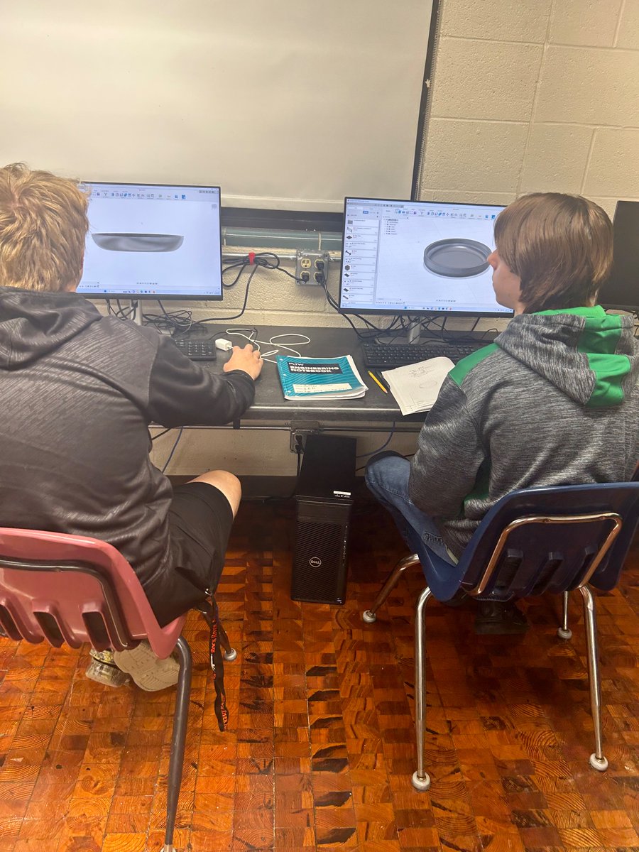 PLTW Introduction to Engineering Design students are partnered up to design a protective case for wired ear buds. #PLTW #BeLeaf
