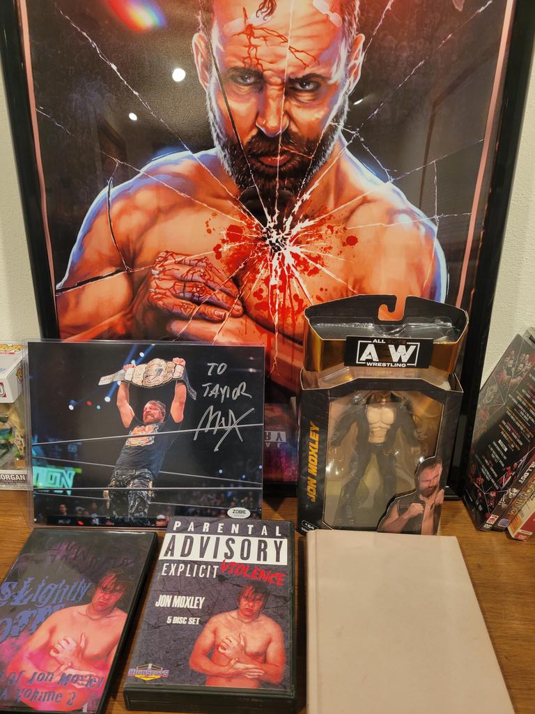 Taylorr1114's tweet photo. @OTT_wrestling Think I'd consider myself a die hard Mox fan. Been my favorite wrestler since 2006. Tons of merch, shirts, action figures, posters, DVDs. I drove 16 hours to meet him at wrestlemania 35. https://t.co/9bRrTpUPCa
