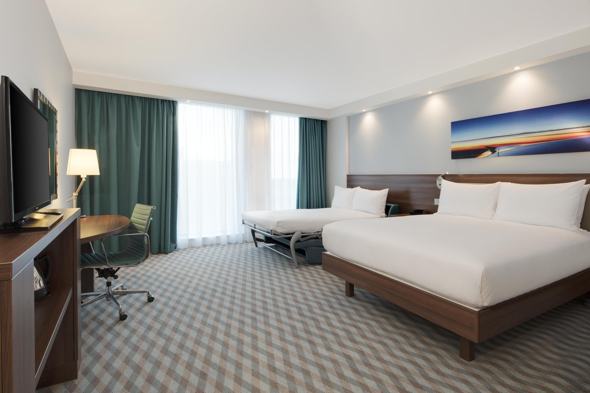 Traveling with the family?  👨‍👩‍👦‍👦
Experience the ultimate comfort and convenience in our Family Rooms at Hampton by Hilton London Stansted Airport. 🏨✈️
Spacious, modern, and designed with your family in mind. 💤
Book now → bit.ly/39RK1OG

#FamilyTravel #LondonHotel
