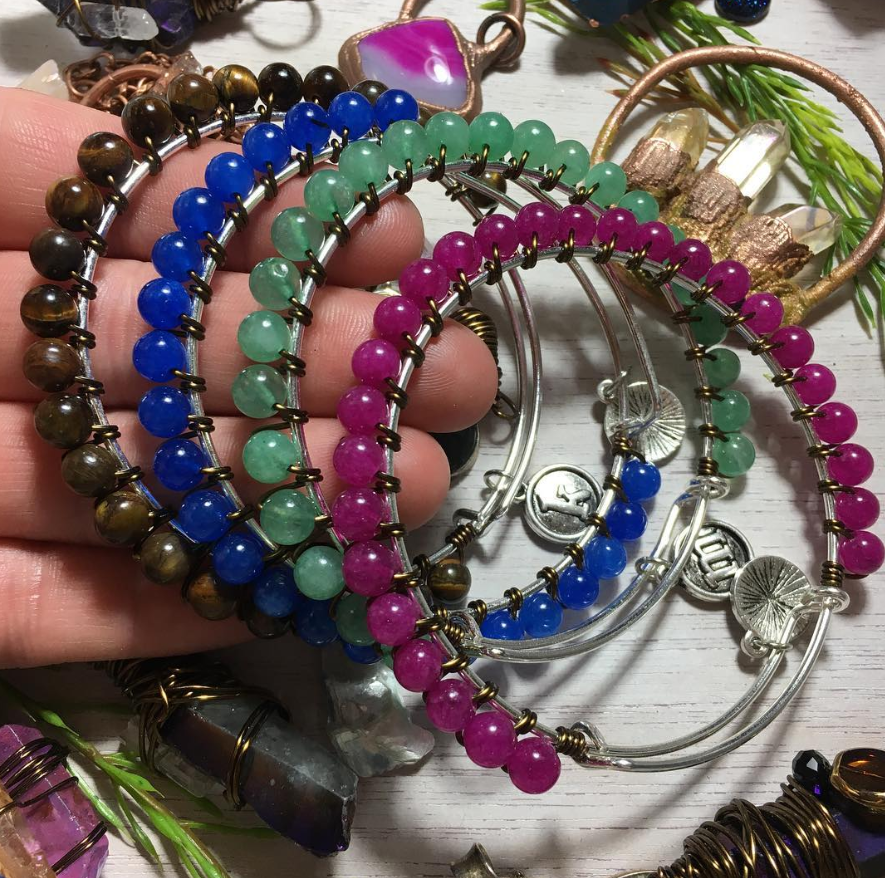 Wire Wrapped Bracelets. Each one is unique with a charm attached, can be customized. #rogue518 #roguesalvagegifts #wirewrapped #bracelets #roguesalvagegifts #picoftheday #troyny #lovemyjob #selfemployeed #hustlehard #onelife #supportyourlocalartist