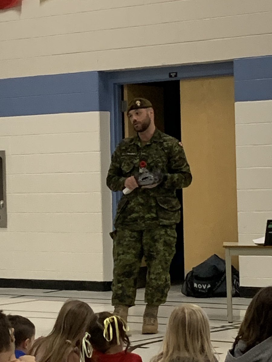 MsBeerkens's tweet photo. Thank you Sgt. Marc-Andre Renaud for presenting to the students at St. Catherine’s about Remembrance Day. #RememberanceDay @StCatherineOCSB https://t.co/zzdc5nwBfI