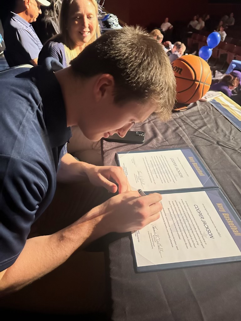 ReaganMBB's tweet photo. Congratulations to @coopjackson2024 on signing his National Letter of Intent to the U.S. Naval Academy! He is the first player at Reagan High School to sign a full scholarship to play Division 1 Men's Basketball! We are proud of you Coop! @NavyBasketball #BringTheJuice https://t.co/TuCmZ2iC6U