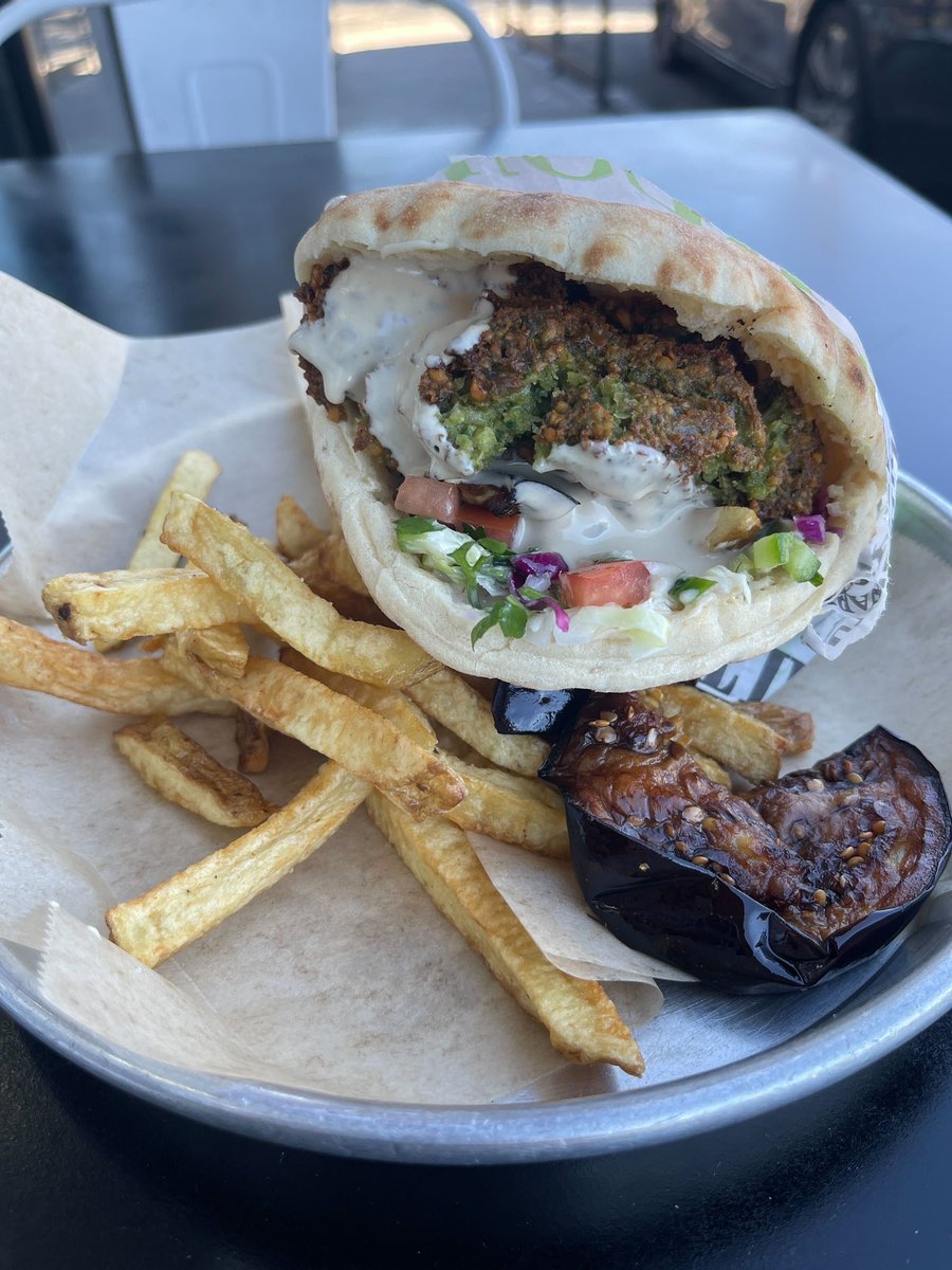 missmayim's tweet image. That moment when you feel a strong desire to eat at an Israeli restaurant with Israeli rock blasting - and also: this wallpaper is everything rn 🇮🇱 🥙