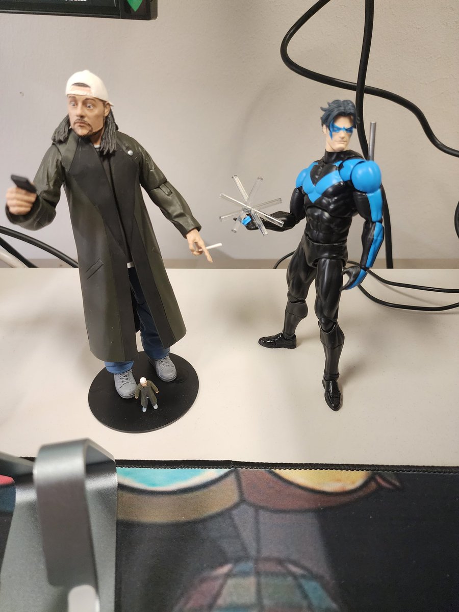 JustInTx's tweet photo. @ThatKevinSmith recently acquired Silent Bob hanging out with Nightwing on my desk. https://t.co/GtKZGha9I6
