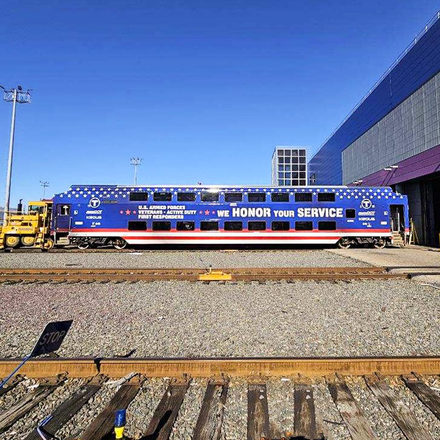 Commuter Rail train in the Veterans' wrap.