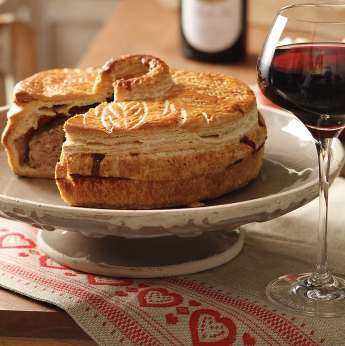 In need of dinner inspo? Try this delicious Alsace specialty: Munster Valley meat pie! Succulent meat with a buttery, flaky crust paired with Alsace Pinot Noir -- it doesn't get much better.

Recipe link in bio.