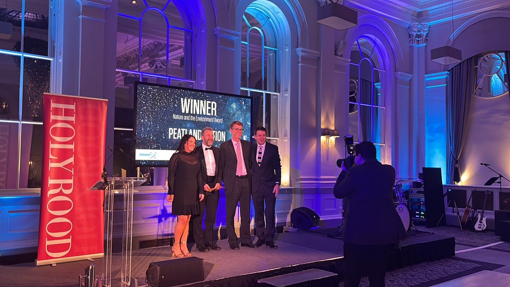 Laura Kane from <a href="/autonomous_iot/">Autonomous_iOt</a> presents <a href="/nature_scot/">Former NatureScot account</a>’s <a href="/PeatlandACTION/">Peatland ACTION</a> team for their award #HolyroodClimateAwards #ScotClimateSeries