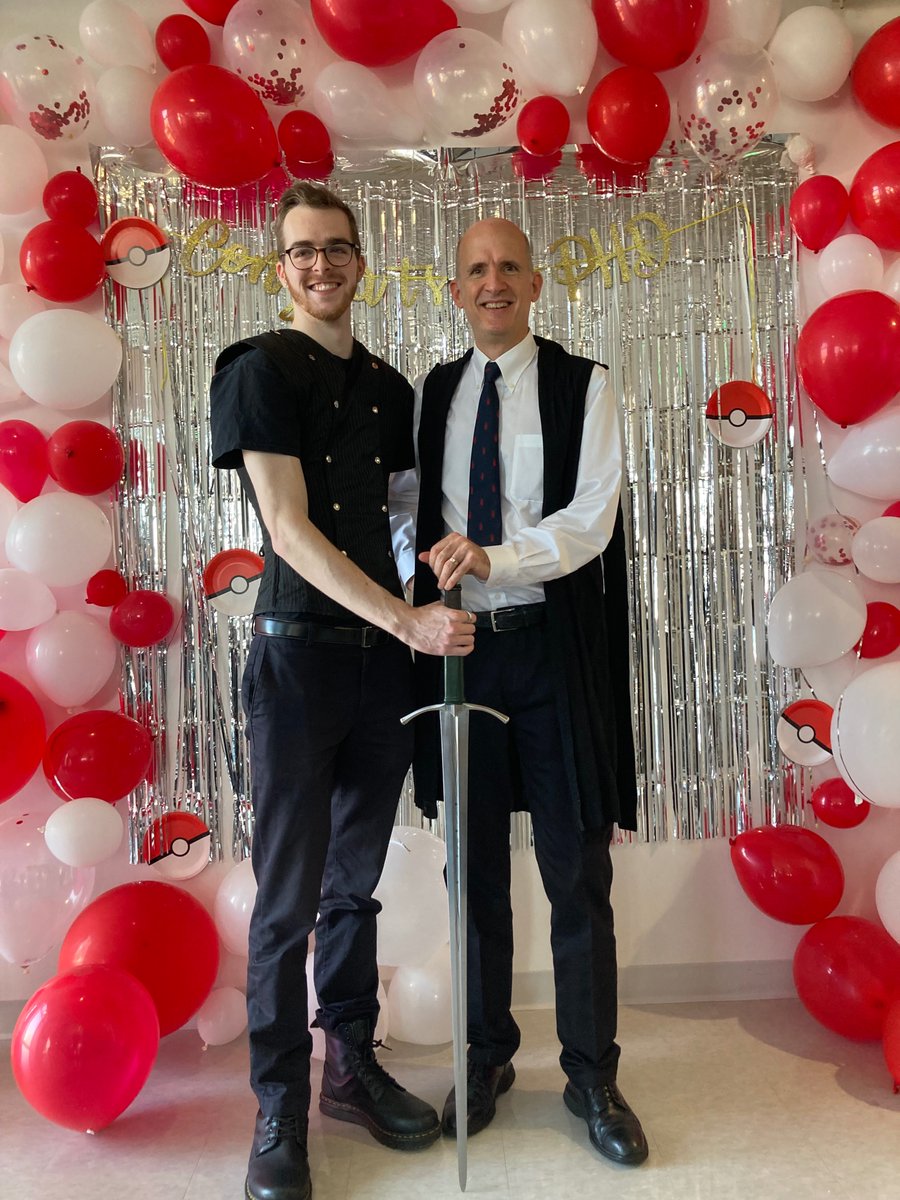 HasselmoMichael's tweet image. Congratulations for an outstanding PhD defense by Dr. L. Kelton Wilmerding @means2anEngram about his dissertation work with me and @okaysteve!  Kelton is a Renaissance Fair fan, so he requested a dubbing ceremony with his own sword.