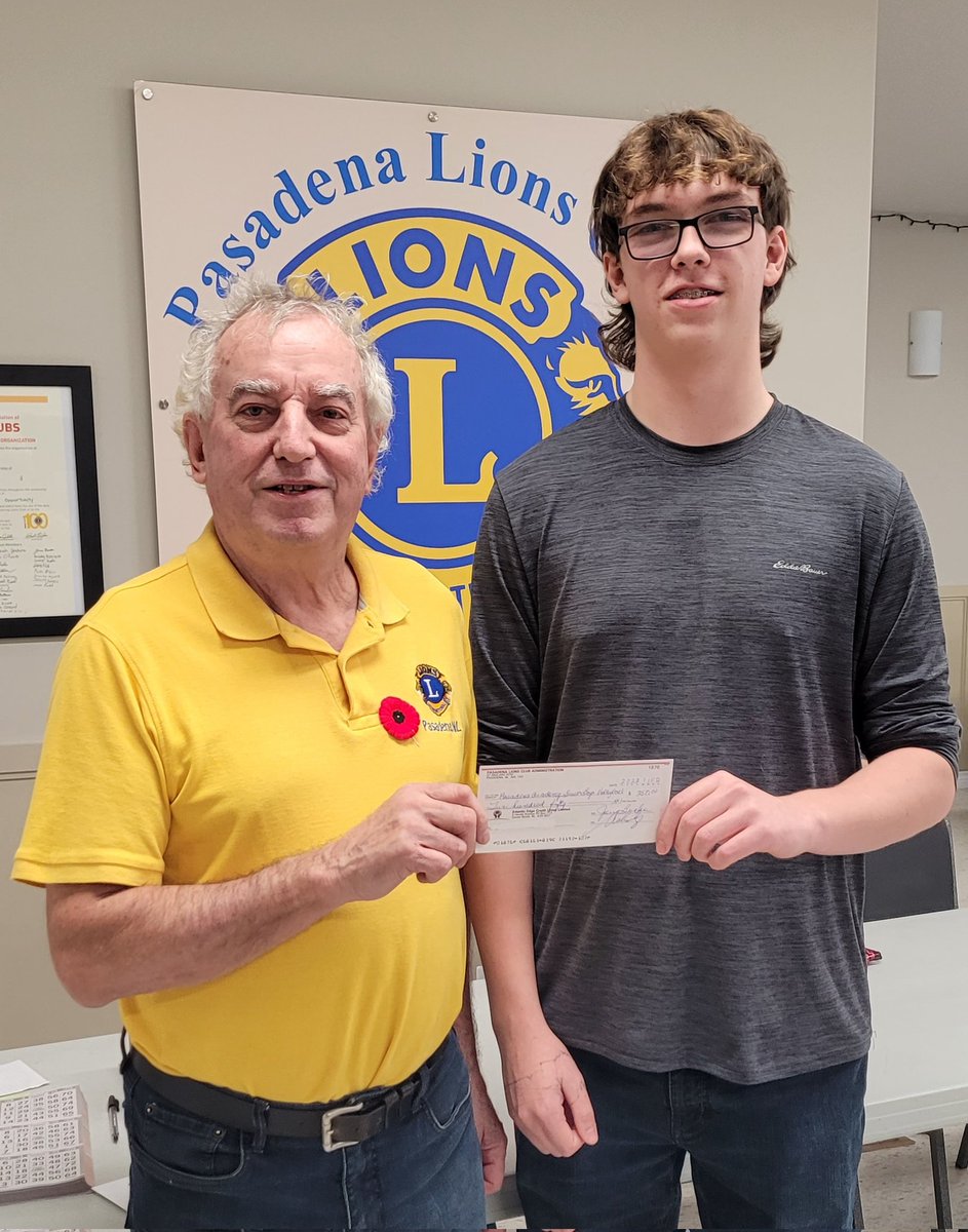 Lion Jerry Brake presents Rowan Matthews with the <a href="/PasadenaAcademy/">Pasadena Academy</a> Senior Boys Volleyball team a donation towards their upcoming travels. Good luck Falcons!