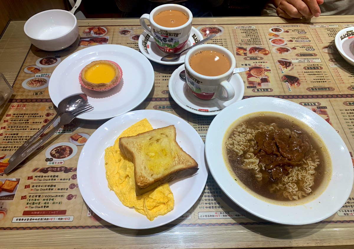 A very typical Kong-style breakfast in Cha Chaan Teng, milk tea is the essential ☕️😋

#HongKong #BreakfastDelight