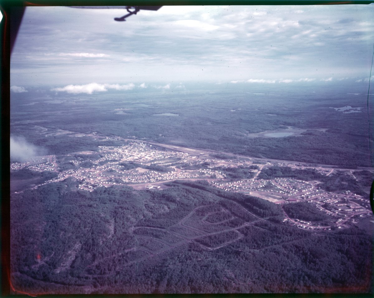 oldcanadaseries's tweet image. Aerial view of Atikokan, Ontario in 1952. credit: @ArchivesOntario