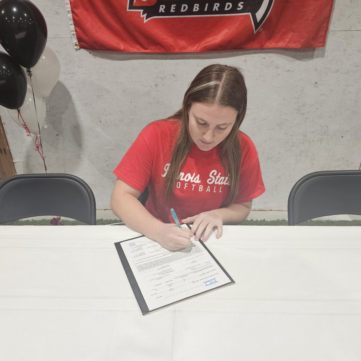 IowaPremierFP's tweet photo. NLI SIGNED! Iowa Premier's @TatumW47 inks her deal D1 to @RedbirdsSB and Coach Kramos!  We are SO PROUD OF U TATUM! #IPFLIFE 💛🖤
#IPFWORKS
#NationalSigningDay2023 https://t.co/iq2GGezCrj
