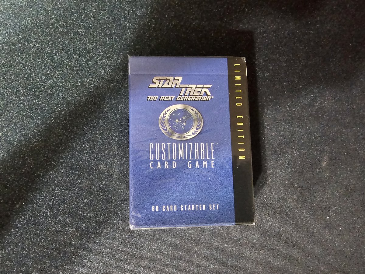 okcoyote's tweet photo. It's time for #packaday entry #74! Today we're opening a black-border Limited starter deck from the Premiere set in Star Trek CCG First Edition! No values given for non-Magic sets, but I'll highlight some of the non-commons. #stccg https://t.co/oKvypux4VS