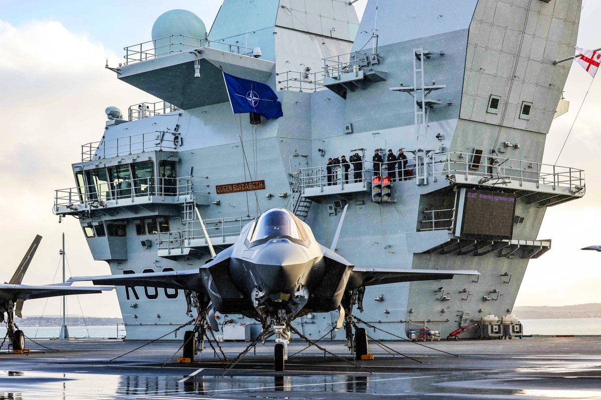 NATO's tweet photo. HMS Queen Elizabeth, @RoyalNavy’s largest and most powerful ship ever built, sails under NATO command for the first time.

The 🇬🇧 aircraft carrier & carrier strike group is deployed alongside Allies for #NeptuneStrike, demonstrating NATO’s ability to protect and defend against any threat 🛡️