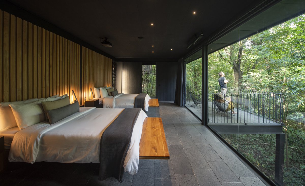 SLHLuxuryHotels's tweet photo. A member of our actively sustainable #ConsiderateCollection, Rio Perdido Hotel &amp; Thermal River lives and breathes its natural surroundings, allowing guests to nestle into suspended bungalows dotted across this beautiful 1,500-acre Costa Rican reserve. 
https://t.co/rEO3YUwHS4 https://t.co/YpsRVLv7b6