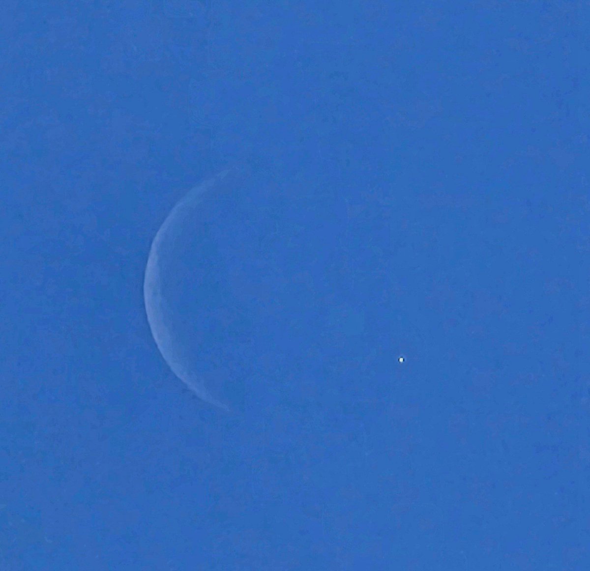 Amazing to use the Lunar occultation of Venus as a way to see Venus with the naked eye at approx 1040am here in UK. 
Yay I saw it! -  as it reappeared to the right lower limb of the moon.