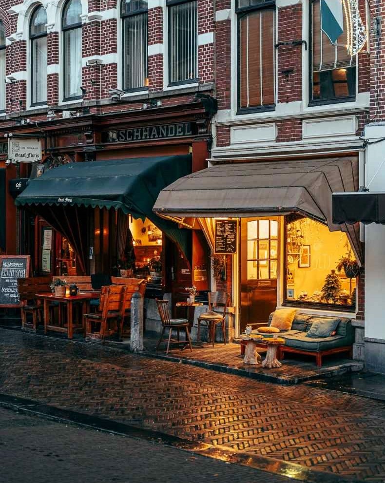 Who Wants to Sit With Me Here? Pick One, or We Can Visit Both.....sigh.   I Want to Live Here. Utrecht, Netherlands

#patiodining #outdoordining #hiddengems #cafe 
#UtrechtNetherlands #architecture #quaint #fineartphotography #romantic