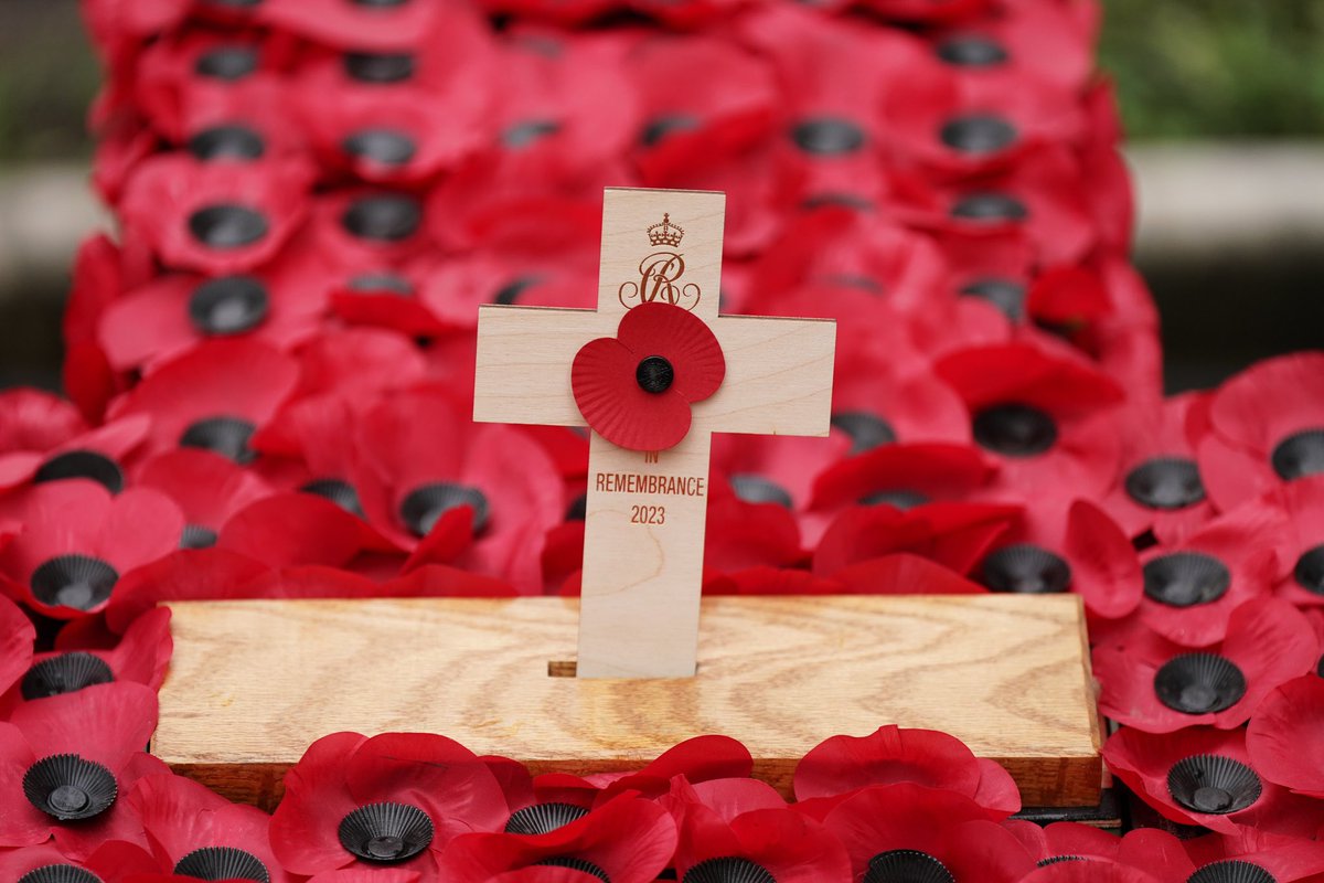 RoyalFamily's tweet photo. At the 95th Field of Remembrance this morning, The Queen planted a Cross of Remembrance and met veterans and serving military personnel at Westminster Abbey.

Since 1928, the land outside @wabbey has been used as a place for people to plant a cross in memory of a loved one. https://t.co/E7bi9tdL9p