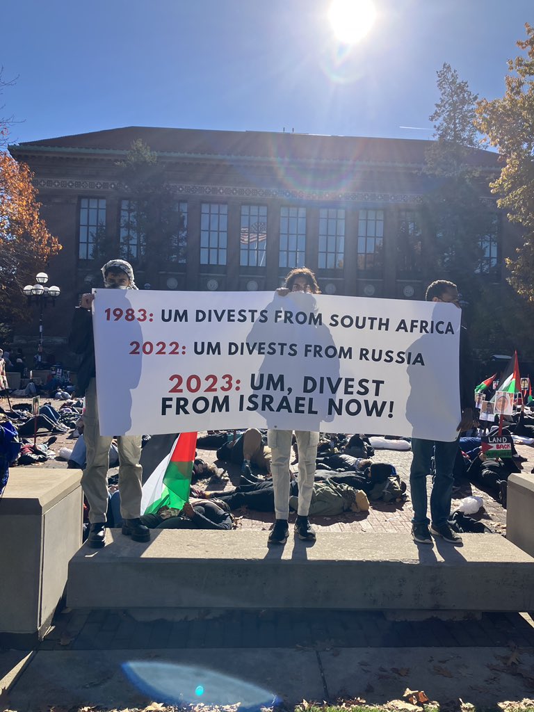 geo3550's tweet photo. HAPPENING NOW: Die-in on the Diag for the 10,000 and counting Palestinian lives lost over the past month. https://t.co/lcMqqjcyFQ