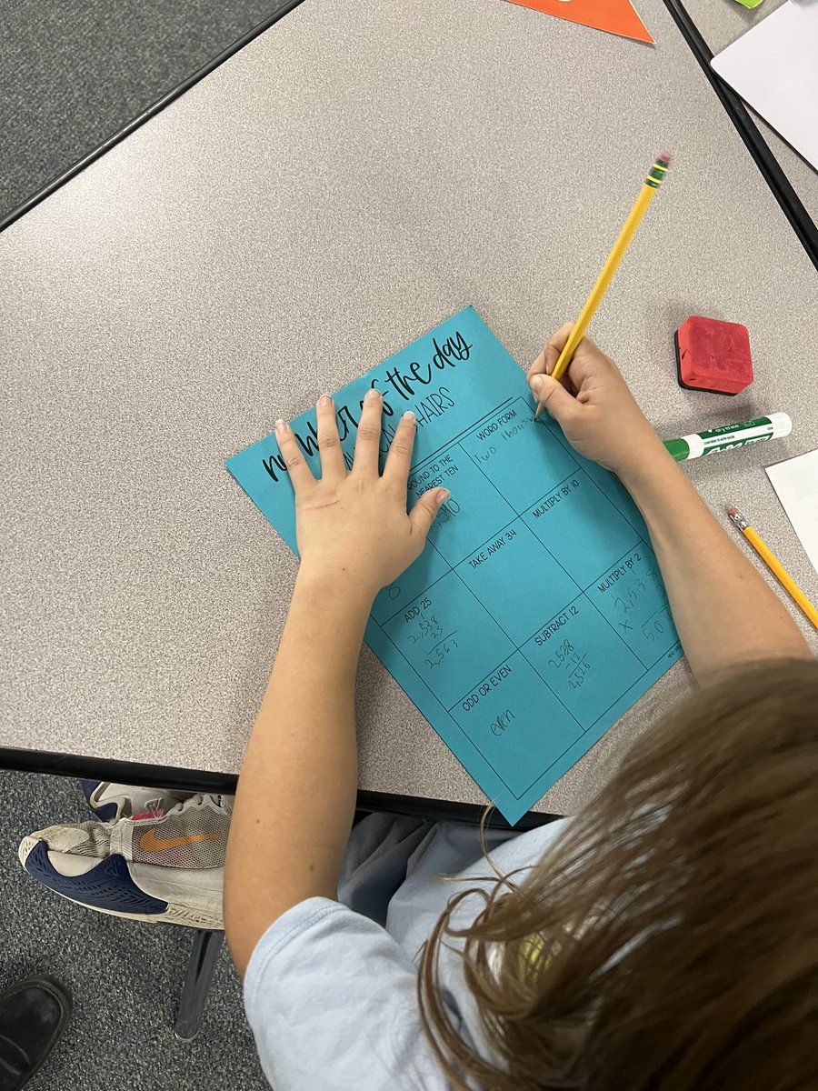 We warmed up for math with “musical chairs.” Each student was given a different number at their seat. I played music and when it stopped, students had to find a seat and fill in one of the boxes (write the number in word form, multiply by 10, etc). They loved it!  #BeEvergreen