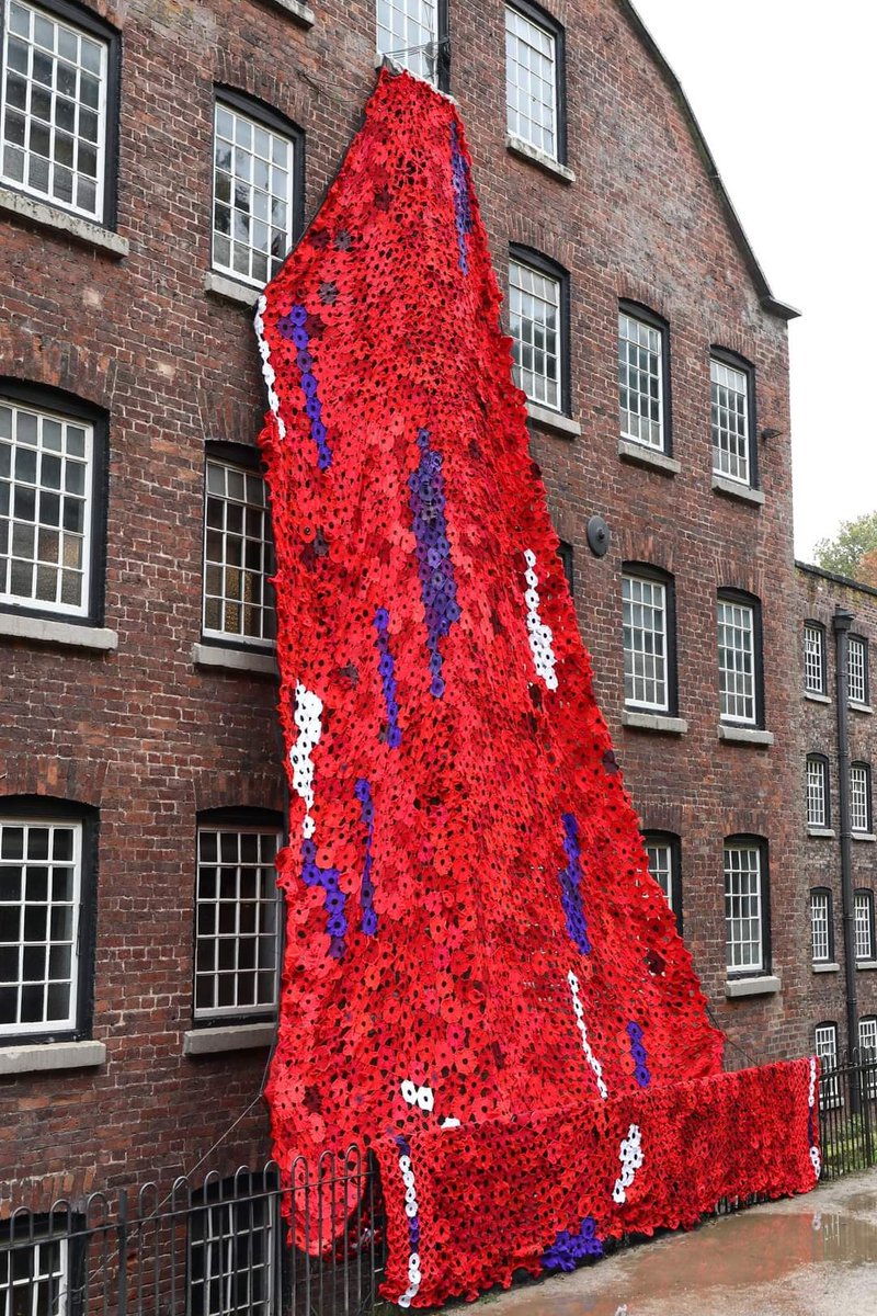 Styal Mill, Cheshire. Has YOUR local mill bothered to drape a stupendous number of Poppies from a window so the building looks like it is vomiting the blood of the #Fallen down itself? No? Perhaps your local mill owner is a member of Isis or the IRA. Demand answers!