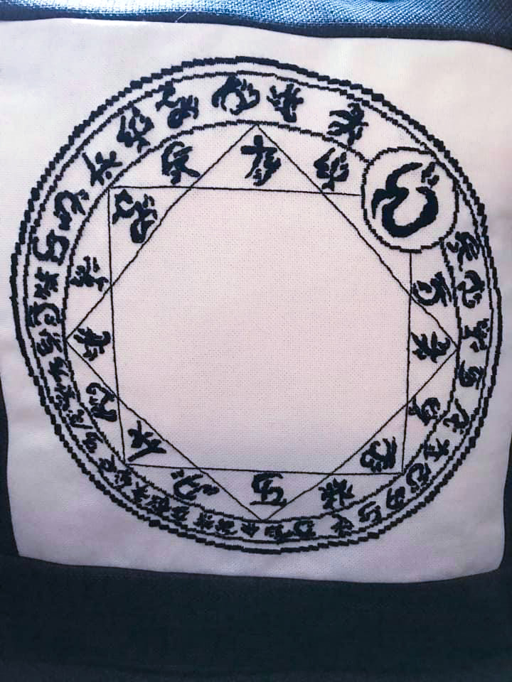PVBrett's tweet photo. Helen Lee turned the ward circle into this beautiful cross-stitch pillow for her sister Amanda. Sometimes I am just stunned at all the incredibly creative ways readers express their love of the series. #petervbrett #demoncycle #fanart #warding https://t.co/12ioDEQdA1
