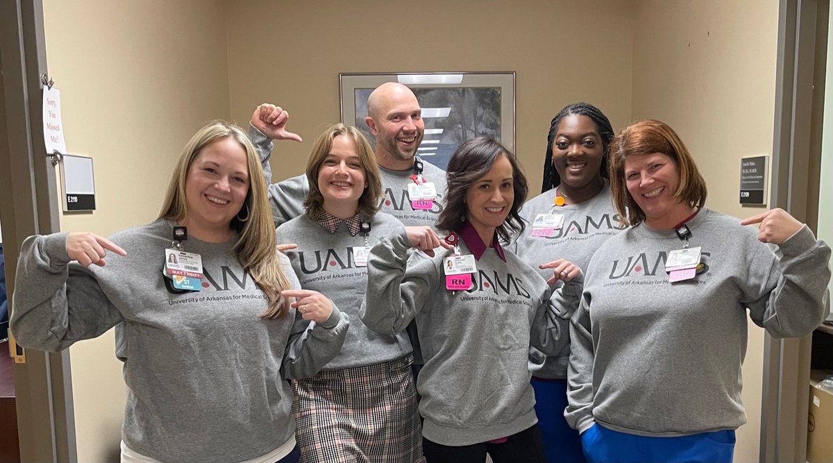 Health care heroes displaying their #TeamUAMS pride in new branded sweatshirts. Just in time for colder weather. 💙