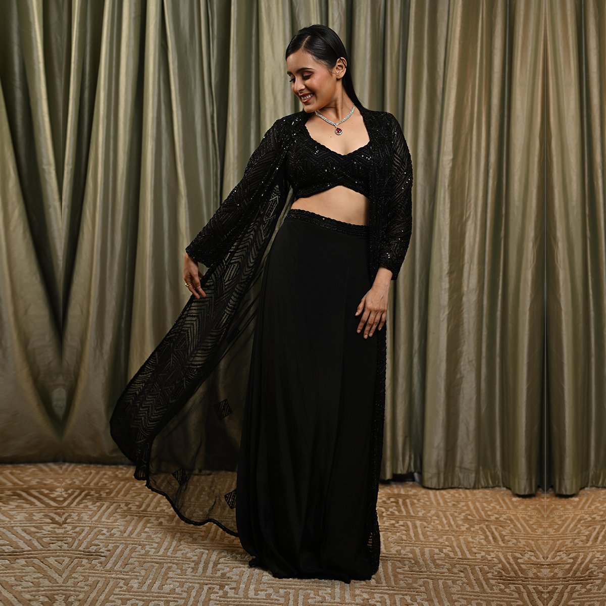 NeerusPriv34992's tweet photo. Elegance in Black 🖤Black dress adorned with a chic top, lehenga, and ethereal jacket, weaving a tale of grace and modern allure ✨Explore the epitome of style as you step into our stores🌟#Neerus #NeerusFashion #NeerusPrivé #FusionWear #IndianEthnicWear #DesignerWear #Luxury https://t.co/DqzBswgGQV
