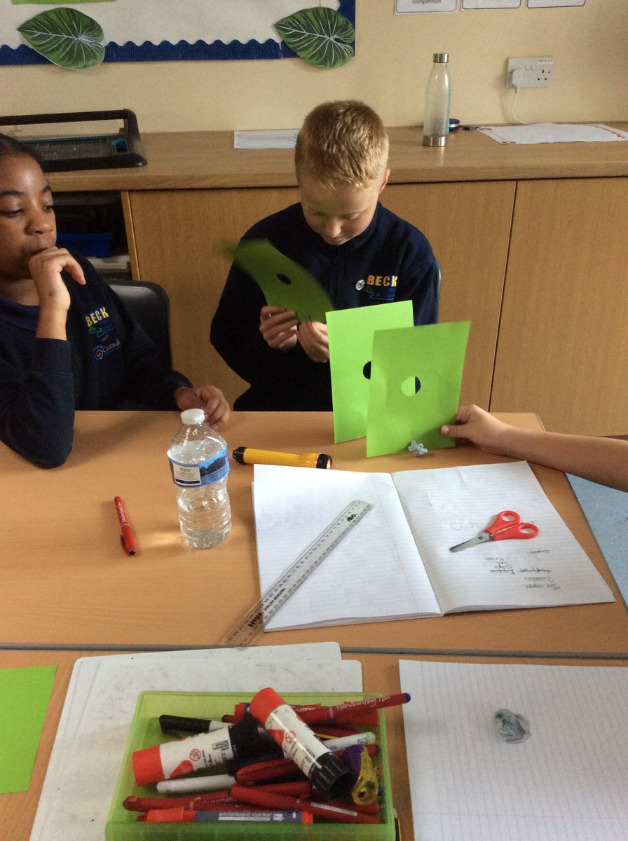Year6Beck's tweet photo. This week, Year6 investigated and proved the theory βLight travels in a straight line!β They used teamwork skills to complete the investigation #BeckScience https://t.co/6UZSMRWvsU