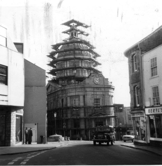 morrablibrary's tweet photo. Market House is covered in scaffolding at the moment so here's a photo from our archive,taken in the 1960s or 70s when it was also wrapped up. Can anyone remember the exact year? #PhotoFriday #ExploreYourArchive #MarketHouse #LovePenzance #Penzance #MarketJewStreet #PhotoArchive https://t.co/vyuE3zKZKJ