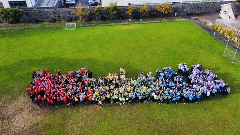 As part of STAND Up week, all students helped to create a human flag out in the garden. Each year group wore a specific colour.