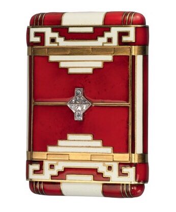 An Art Deco enamel, gold and diamond cigarette case.