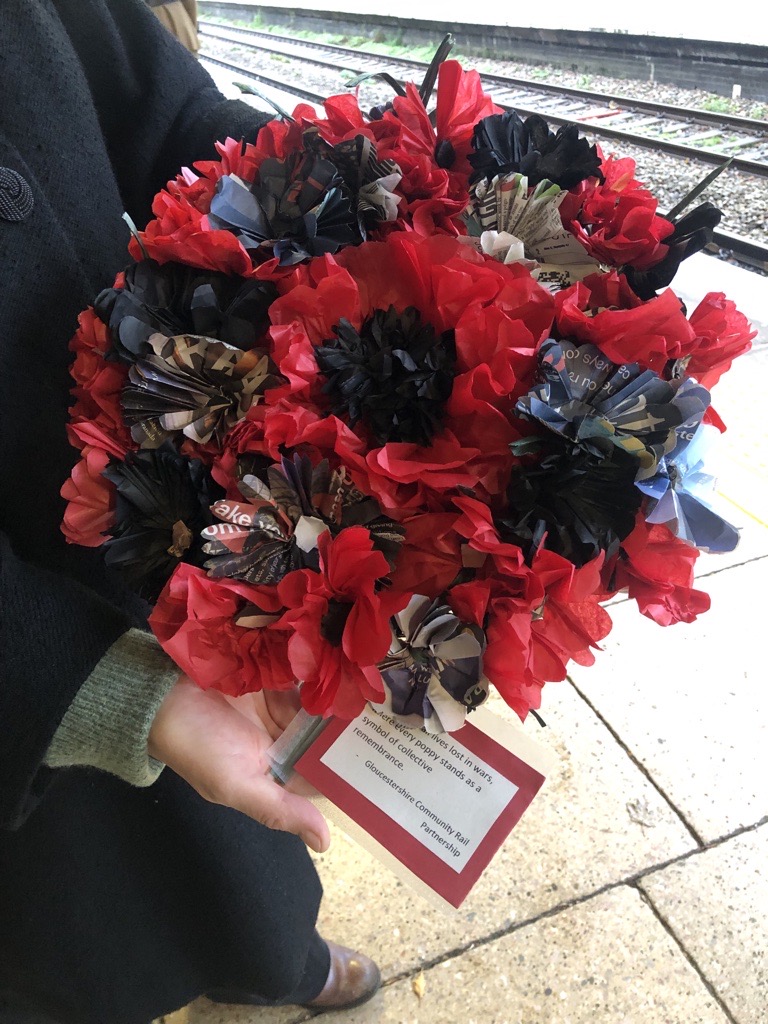 glos_crp's tweet photo. We were delighted to take part in this year's #PoppiestoPaddington organised by @VETERANSCHARITY and supported by @GWRHelp We added our hand made wreath to others at Stroud station headed for London... https://t.co/SF6UAh6HxD