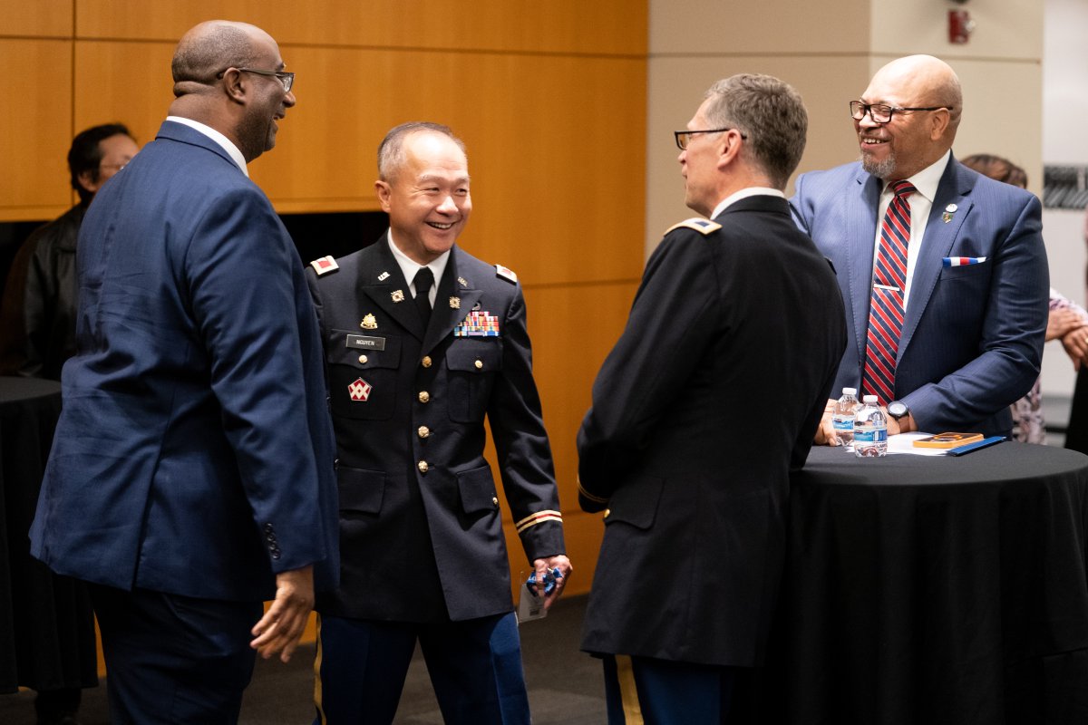 uspto's tweet photo. The USPTO Military Association hosted a Veterans Day celebration yesterday featuring guest speaker Lt. Col. Eric Atkisson, USA (Retired), the agency’s communications division manager, as well as a musical performance by the agency chorus group Patenteers. #VeteransDay #TeamUSPTO https://t.co/RJyYq7sR0f
