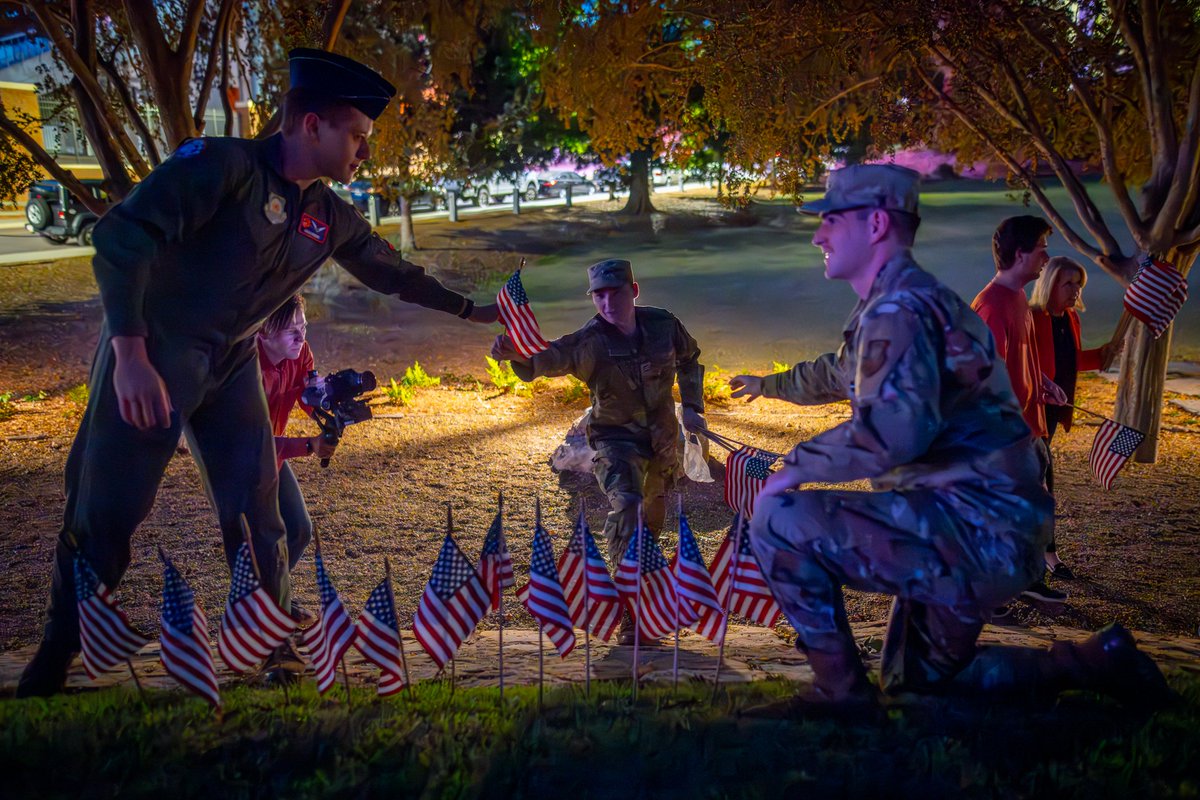 kenscar1's tweet photo. More than 100 people showed up last night to place flags around the Scroll of Honor for Veterans Day. Flags ringed the Scroll in record time, even in the dark! #VeteransDay2023 https://t.co/ZFv0Ls1U4B
