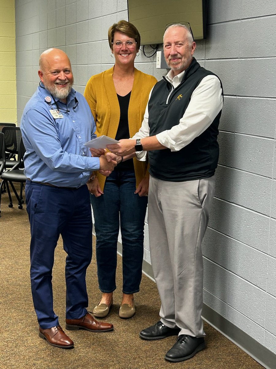 Community Hospital in Anderson recently presented MG Board President Mary Jo Brunt and Supt. Steve Vore with a donation from the Community Chef fundraising eventevent. Thanks to Mr. Herniak for representing the Argylls as our Community Chef! 

#WeAreMG