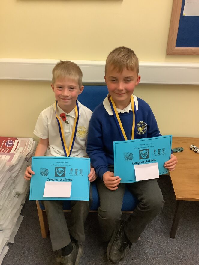 A huge well done to these boys who have run a whole MARATHON around the  school field over the last few weeks - very impressive!