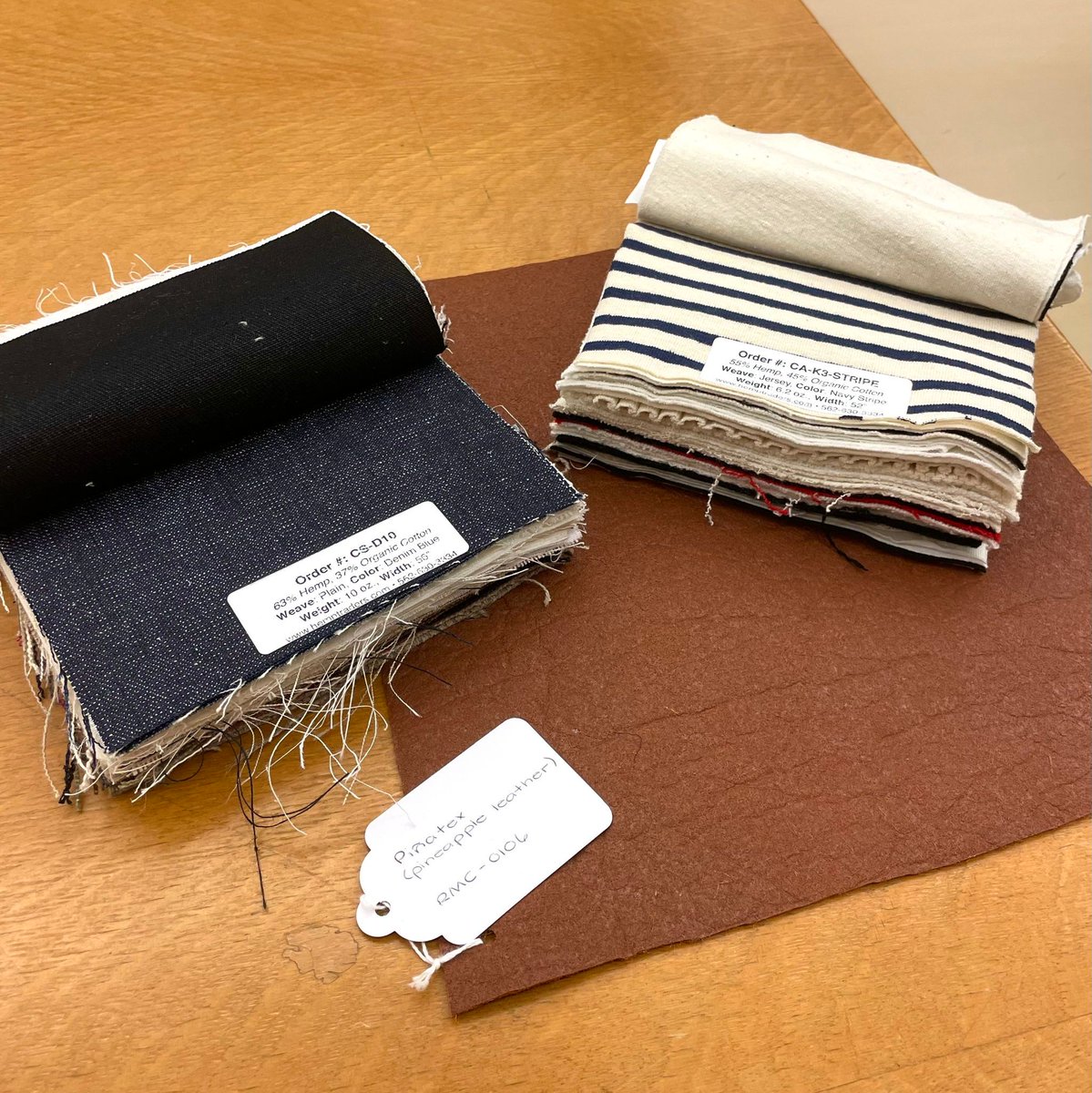 RickerLibraryUI's tweet image. Friday is for #MaterialsLibrary highlights now! Featuring in our textile collection is the handy hemp fiber sample book, Hemp Traders Fabric Swatch Book, and the cool alternative leather made from pineapple wastes, #Piñatex. Free to touch and feel and only at the Ricker Library😎