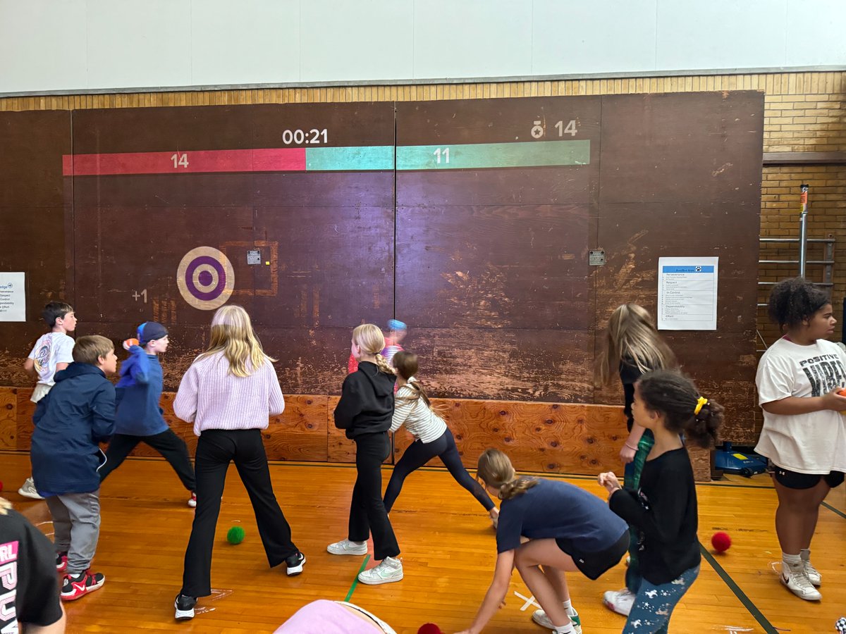 🎾@QtownElementary students are testing out the Lu Interactive Playground to test the speed and accuracy of their throws by hitting targets of the same color. 🎯#QCSDProud #PantherPride