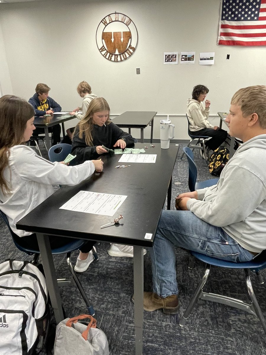 Working on our money skills in Personal Finance! #ExcellenceEverywhere #GoWahooBlue <a href="/wahoopublic/">Wahoo Public Schools</a>