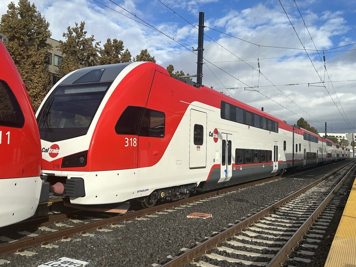 Caltrain's tweet image. Today on #WorldPublicTransportDay we’d like to highlight the importance of using public transportation to reduce the negative effects of greenhouse gas emissions caused by traffic. With our new electric trains we will be one step closer to a greener future. ⚡️
