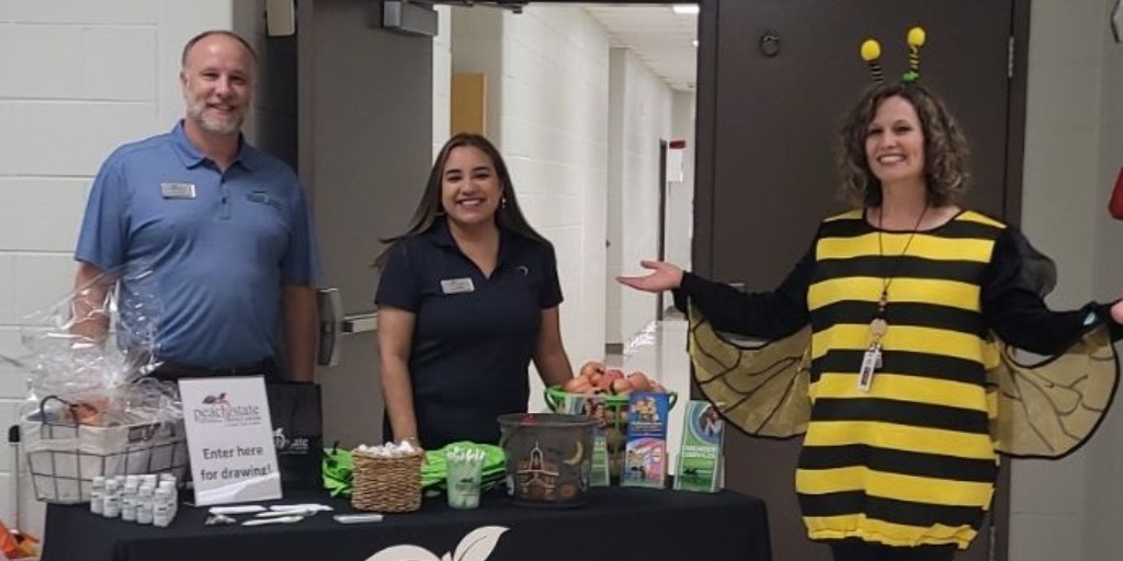 In Case You Missed It – PSFCU team members attended Cornelia Elementary’s Book or Treat event last week. School staff dressed up as characters from their favorite books, while the children made rounds collecting candy. It was surely a treat BEEing a part of this fun event! 🐝🍬