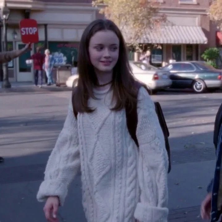 winonaddict's tweet photo. travis wearing the rory gilmore sweater he’s too real https://t.co/J6wnkByX1V