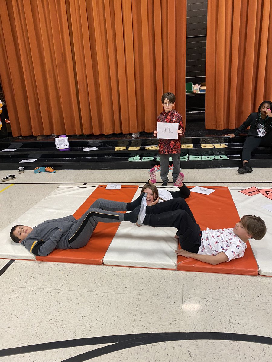 4th grade enjoying their gymnastic stations