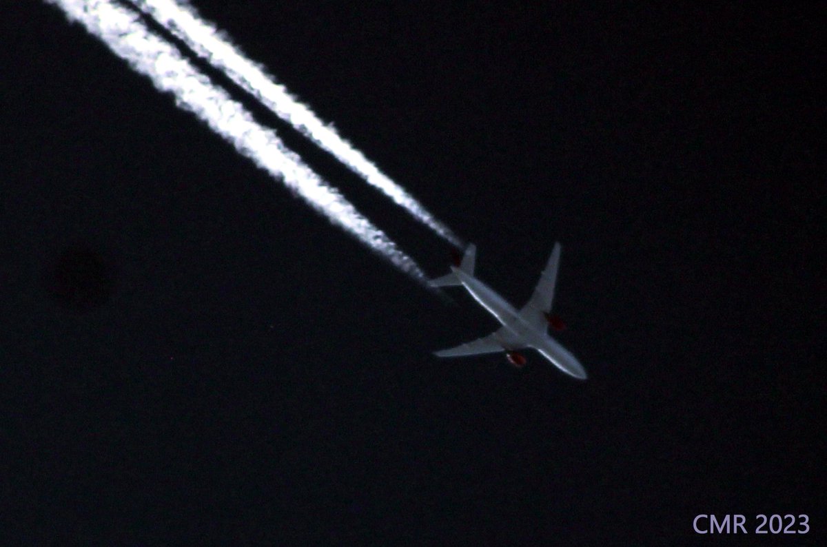 Was out front this afternoon trying to get a pic of the Tyndall T-38s that were visiting; didn't manage with that, but did see this Omni Air 777-200 overhead at 40,000 feet: